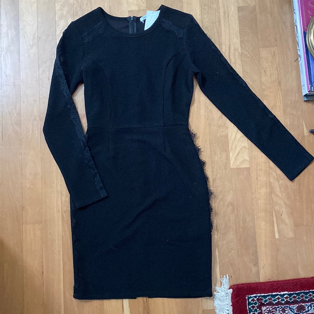 Beautiful high neck fitted black dress with detail